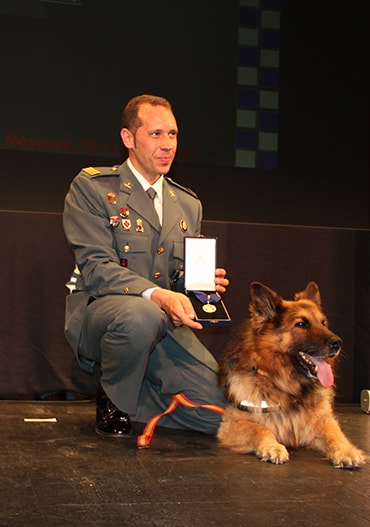 Ajax the dog with his handler