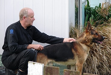 Gagethe dog with his handler