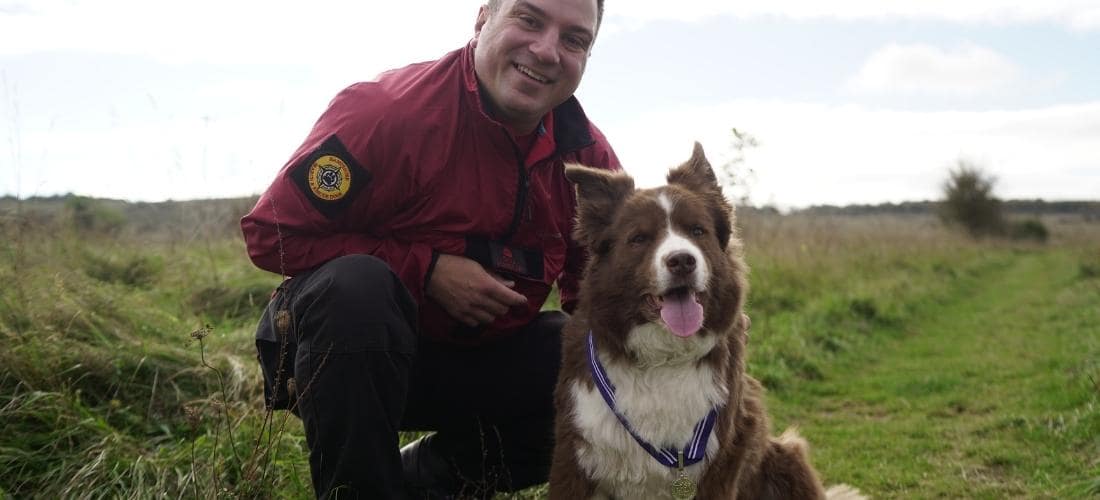 Zak with his handler and owner