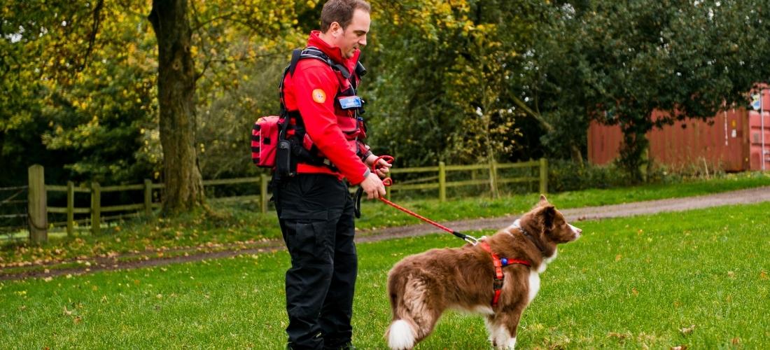 Zak with his handler and owner