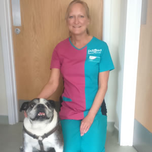 Melissa, Community and Education Vet Nurse, next to her Bulldog Winston