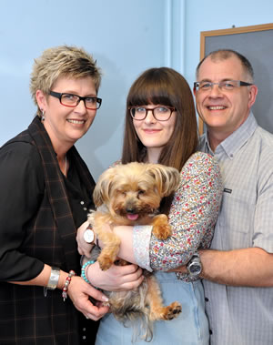 Eddie the dog with family