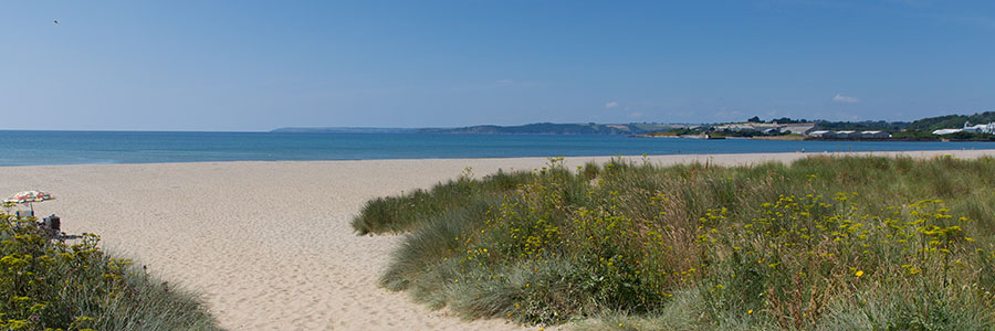 Photo of Par Sands Beach on a sunny day